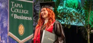 web-featured-graduate-satyne-doner-walking-stage